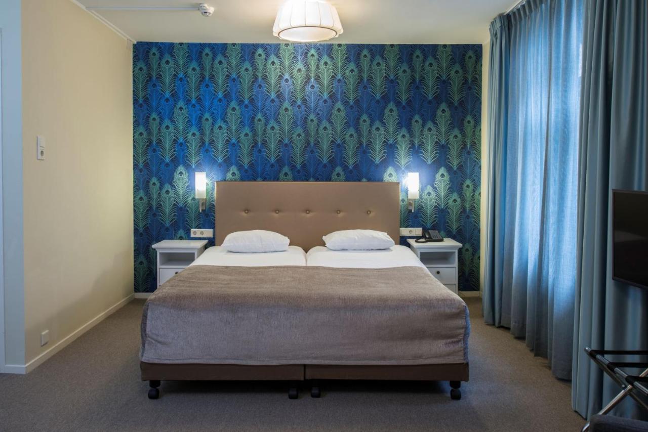 City Hotel Nieuw Minerva เลเดน ภายนอก รูปภาพ